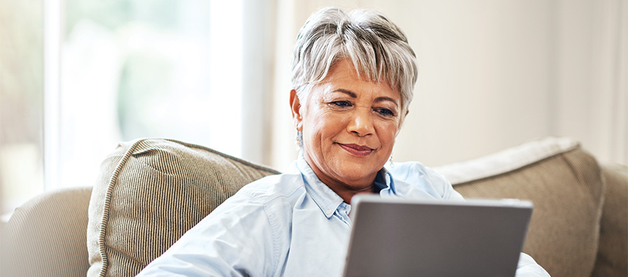 Mature woman looking at tablet